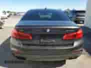 2020 BMW 5 Series M550i xDrive with VIN WBAJS7C06LCD34796, listed as a Copart auction lot 90484235 with 58,399 mi miles and Clean title. Bid and sale history available at DreamBid. Image 6.