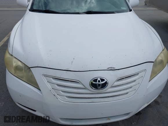 2007 Toyota Camry LE z VIN 4T1BE46K47U675780, wystawiony jako IAAI lot #43411579 z przebiegiem 178 125 mil mil oraz . Historia ofert i sprzedaży dostępna na DreamBid. Obrazek 12.