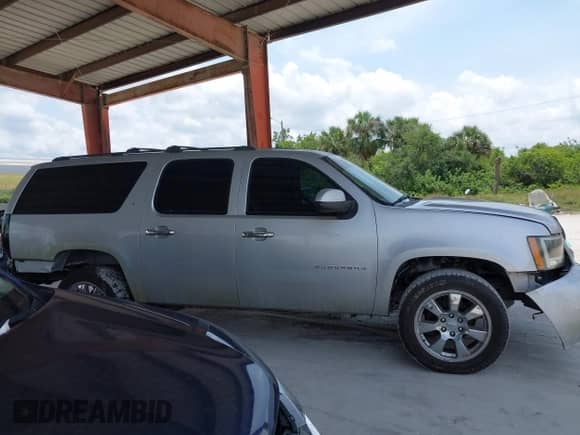 2013 Chevrolet Suburban LT with VIN 1GNSCJE03DR105672, listed as a IAAI auction lot 42197168 with 192,860 mi miles and . Bid and sale history available at DreamBid. Image 13.