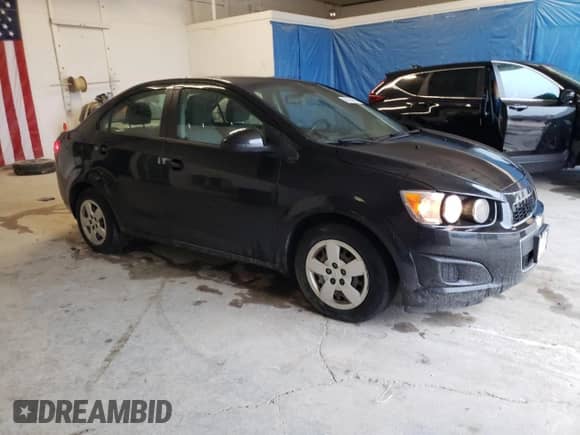 2013 Chevrolet Sonic LS с VIN 1G1JA5SH1D4144181, выставлен на аукционе Copart как лот 81602455 с пробегом 97 439 миль миль и Списание • Salvage title. История ставок и продаж доступна на DreamBid. Изображение 4.