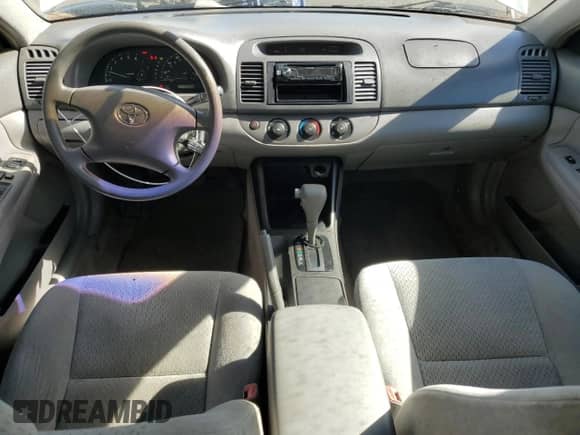 2004 Toyota Camry LE с VIN 4T1BE32K74U340136, выставлен на аукционе Copart как лот 82675565 с пробегом 172 175 миль миль и Чистый • Clean title. История ставок и продаж доступна на DreamBid. Изображение 8.