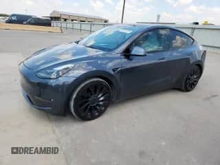 2023 Tesla Model Y Performance z VIN 7SAYGDEF0PF902259, wystawiony jako Copart lot #69791305 z przebiegiem 16 874 mil mil oraz Szkoda całkowita • Salvage title. Historia ofert i sprzedaży dostępna na DreamBid. Obrazek 1.