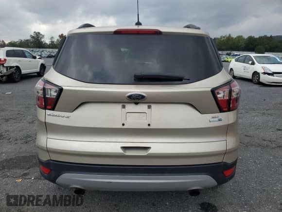 2017 Ford Escape SE with VIN 1FMCU9GD4HUD57275, listed as a Copart auction lot 84275445 with Not provided miles and Clean title. Bid and sale history available at DreamBid. Image 6.
