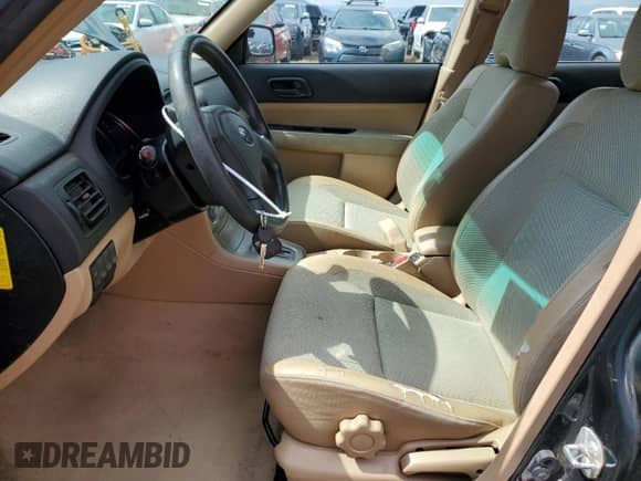 2005 Subaru Forester X with VIN JF1SG636X5H715969, listed as a Copart auction lot 65039555 with 104,988 mi miles and Clean title. Bid and sale history available at DreamBid. Image 7.