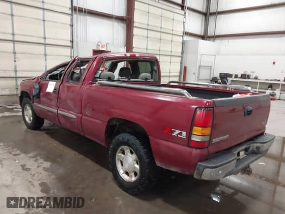 2005 GMC Sierra 1500 SLE with VIN 2GTEK19B551288460, listed as a IAAI auction lot 41543395 with 303,314 mi miles and . Bid and sale history available at DreamBid. Image 3.