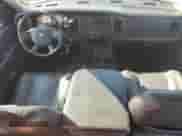 2004 Dodge 1500 SLT z VIN 1D7HU18NX4J261459, wystawiony jako Copart lot #66524055 z przebiegiem 150 963 mil mil oraz Szkoda całkowita • Salvage title. Historia ofert i sprzedaży dostępna na DreamBid. Obrazek 8.