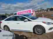 2015 Hyundai Sonata Sport z VIN 5NPE34AF4FH153984, wystawiony jako IAAI lot #43444521 z przebiegiem 124 295 mil mil oraz . Historia ofert i sprzedaży dostępna na DreamBid. Obrazek 13.