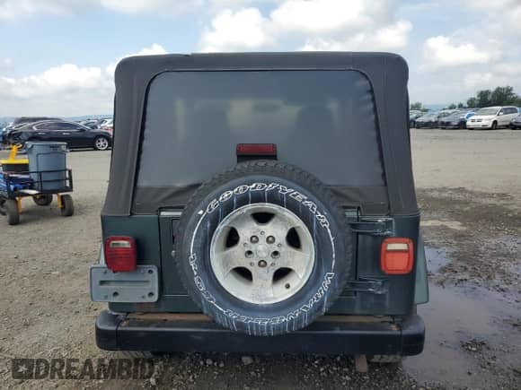 2003 Jeep Wrangler Sahara с VIN 1J4FA59S73P308250, выставлен на аукционе Copart как лот 64305965 с пробегом 186 288 миль миль и Чистый • Clean title. История ставок и продаж доступна на DreamBid. Изображение 6.