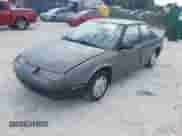 1994 Saturn SL with VIN 1G8ZF559XRZ190063, listed as a IAAI auction lot 42467911 with 66,680 mi miles and . Bid and sale history available at DreamBid. Image 2.