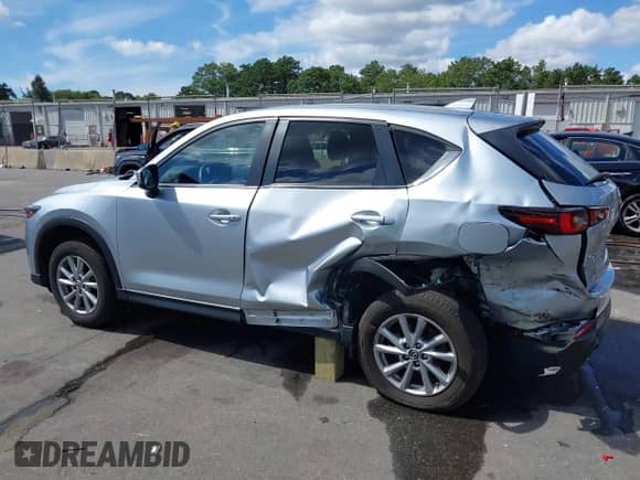 2023 Mazda CX-5 S Select with VIN JM3KFBBM6P0208887, listed as a IAAI auction lot 43113803 with 26,288 mi miles and . Bid and sale history available at DreamBid. Image 6.