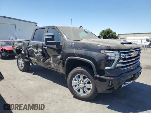 2024 Chevrolet Silverado 2500HD High Country с VIN 2GC4YRE71R1110187, выставлен на аукционе Copart как лот 67950315 с пробегом 34 257 миль миль и Списание • Salvage title. История ставок и продаж доступна на DreamBid. Изображение 4.