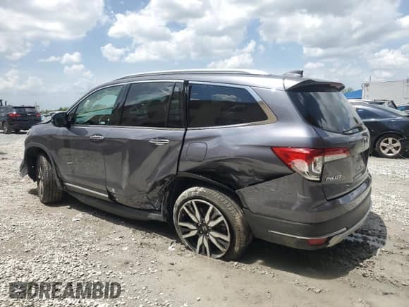 2021 Honda Pilot Touring 8-Passenger z VIN 5FNYF5H95MB011570, wystawiony jako Copart lot #70447465 z przebiegiem 56 212 mil mil oraz Szkoda całkowita • Salvage title. Historia ofert i sprzedaży dostępna na DreamBid. Obrazek 2.