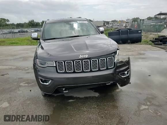 2017 Jeep Grand Cherokee Overland with VIN 1C4RJECG5HC605538, listed as a Copart auction lot 81946415 with 100,658 mi miles and Salvage title. Bid and sale history available at DreamBid. Image 15.