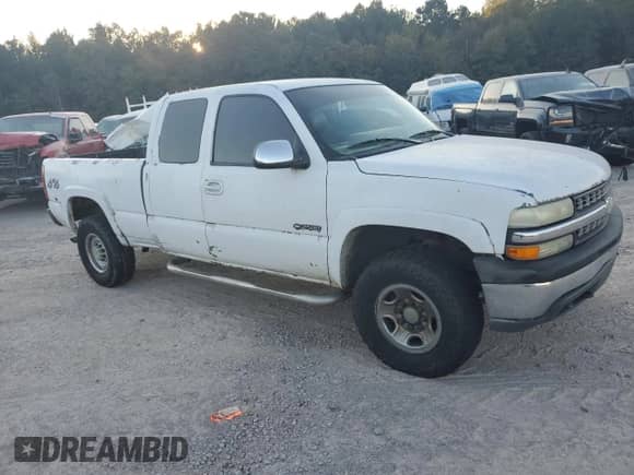 1999 Chevrolet Silverado 2500 LS z VIN 1GCGK29U0XE230564, wystawiony jako Copart lot #77198844 z przebiegiem 245 503 mil mil oraz Szkoda całkowita • Salvage title. Historia ofert i sprzedaży dostępna na DreamBid. Obrazek 4.