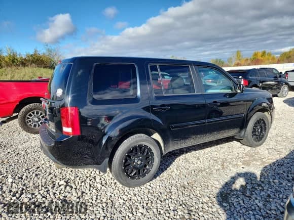 2014 Honda Pilot EX with VIN 5FNYF4H41EB031735, listed as a Copart auction lot 87399015 with 184,952 mi miles and Clean title. Bid and sale history available at DreamBid. Image 3.