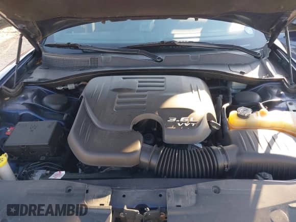 2015 Dodge Charger SE with VIN 2C3CDXBG1FH811898, listed as a IAAI auction lot 42086215 with 112,722 mi miles and . Bid and sale history available at DreamBid. Image 10.
