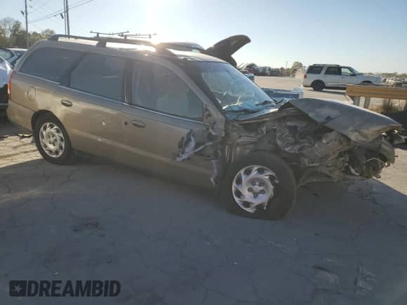 2000 Saturn LW with VIN 1G8JU82F8YY643924, listed as a Copart auction lot 76891614 with Not provided miles and Salvage title. Bid and sale history available at DreamBid. Image 4.