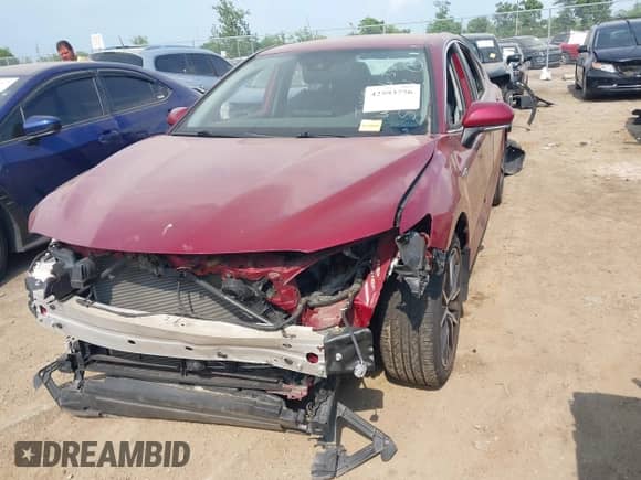 2021 Toyota Camry Hybrid XLE with VIN 4T1F31AK2MU548471, listed as a IAAI auction lot 42593756 with 48,076 mi miles and . Bid and sale history available at DreamBid. Image 13.