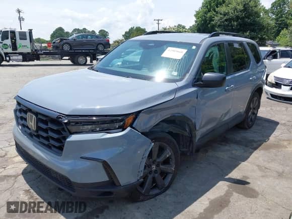 2023 Honda Pilot Sport z VIN 5FNYG1H31PB052865, wystawiony jako IAAI lot #42503668 z przebiegiem 23 349 mil mil oraz . Historia ofert i sprzedaży dostępna na DreamBid. Obrazek 2.