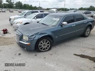 2005 Chrysler 300 300C AWD with VIN 2C3AK63H15H611519, listed as a Copart auction lot 63765655 with 168,036 mi miles and Salvage title. Bid and sale history available at DreamBid. Image 1.