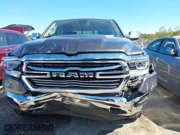 2020 Ram 1500 Laramie with VIN 1C6SRFRT7LN344695, listed as a IAAI auction lot 43316492 with 57,326 mi miles and . Bid and sale history available at DreamBid. Image 6.