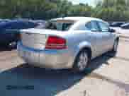 2010 Dodge Avenger SXT with VIN 1B3CC4FB1AN182172, listed as a IAAI auction lot 43319102 with 153,566 mi miles and . Bid and sale history available at DreamBid. Image 4.