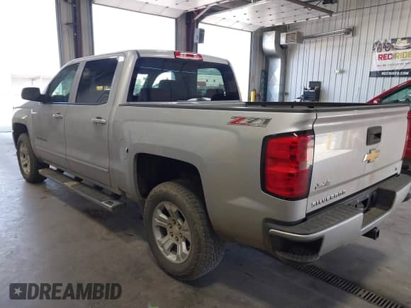 2016 Chevrolet Silverado 1500 LT with VIN 3GCUKREC0GG377694, listed as a IAAI auction lot 42638841 with 117,039 mi miles and . Bid and sale history available at DreamBid. Image 3.
