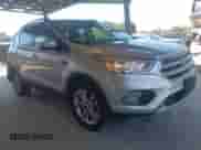 2018 Ford Escape SE with VIN 1FMCU9GDXJUC62452, listed as a IAAI auction lot 43119355 with 117,966 mi miles and . Bid and sale history available at DreamBid. Image 1.