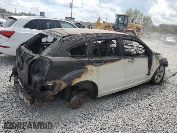 2011 Dodge Caliber Mainstreet z VIN 1B3CB3HA1BD116049, wystawiony jako Copart lot #71008615 z przebiegiem Nie podano mil oraz Nie do naprawy • Non repairable. Historia ofert i sprzedaży dostępna na DreamBid. Obrazek 3.