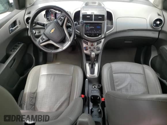 2014 Chevrolet Sonic LTZ с VIN 1G1JE6SB9E4130200, выставлен на аукционе Copart как лот 55669475 с пробегом 104 635 миль миль и Списание • Salvage title. История ставок и продаж доступна на DreamBid. Изображение 8.