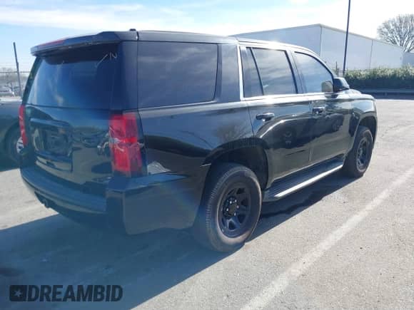 2017 Chevrolet Tahoe with VIN 1GNLCDKCXHR240934, listed as a IAAI auction lot 41430391 with 167,428 mi miles and . Bid and sale history available at DreamBid. Image 4.