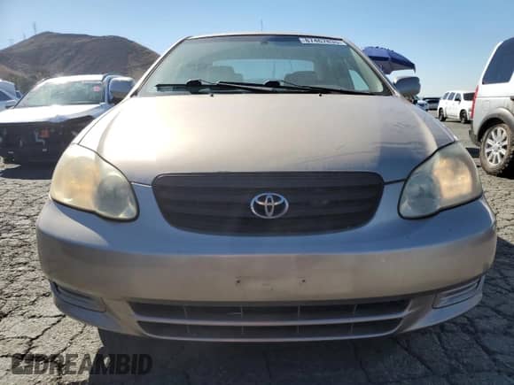 2004 Toyota Corolla CE z VIN 1NXBR32E94Z301126, wystawiony jako Copart lot #87467835 z przebiegiem 181 189 mil mil oraz Szkoda całkowita • Salvage title. Historia ofert i sprzedaży dostępna na DreamBid. Obrazek 5.