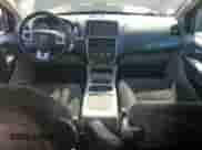 2014 Dodge Grand Caravan SXT z VIN 2C4RDGCG3ER392837, wystawiony jako Copart lot #67765995 z przebiegiem 164 919 mil mil oraz Szkoda całkowita • Salvage title. Historia ofert i sprzedaży dostępna na DreamBid. Obrazek 8.