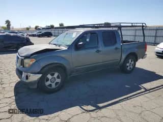 2006 Nissan Frontier SE with VIN 1N6AD07U36C427985, listed as a Copart auction lot 65688815 with 327,628 mi miles and Salvage title. Bid and sale history available at DreamBid. Image 1.