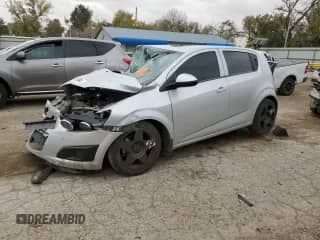 2014 Chevrolet Sonic LS с VIN 1G1JB6SH8E4116933, выставлен на аукционе Copart как лот 78400734 с пробегом Не указан миль и Списание • Salvage title. История ставок и продаж доступна на DreamBid. Изображение 1.