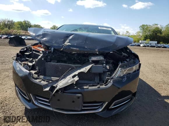 2018 Chevrolet Impala Premier z VIN 2G1125S36J9112708, wystawiony jako Copart lot #80511085 z przebiegiem Nie podano mil oraz Szkoda całkowita • Salvage title. Historia ofert i sprzedaży dostępna na DreamBid. Obrazek 5.