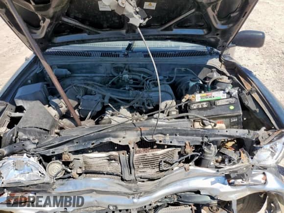 1997 Toyota Tacoma z VIN 4TAVL52N6VZ319081, wystawiony jako Copart lot #71695955 z przebiegiem 262 304 mil mil oraz Szkoda całkowita • Salvage title. Historia ofert i sprzedaży dostępna na DreamBid. Obrazek 11.