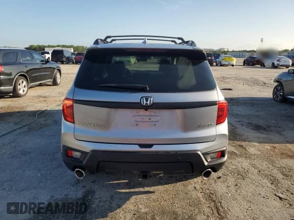 2023 Honda Passport EX-L with VIN 5FNYF8H55PB008414, listed as a Copart auction lot 67765585 with 18,682 mi miles and Non repairable. Bid and sale history available at DreamBid. Image 6.