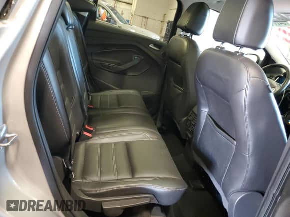 2017 Ford Escape Titanium with VIN 1FMCU9JD1HUA79587, listed as a Copart auction lot 84209285 with 61,058 mi miles and Clean title. Bid and sale history available at DreamBid. Image 11.