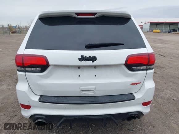 2015 Jeep Grand Cherokee SRT with VIN 1C4RJFDJ4FC882940, listed as a IAAI auction lot 43549108 with 18,901 mi miles and . Bid and sale history available at DreamBid. Image 16.