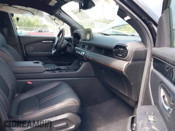 2025 Honda Pilot TrailSport with VIN 5FNYG1H63SB029218, listed as a IAAI auction lot 42671510 with 31,583 mi miles and . Bid and sale history available at DreamBid. Image 5.