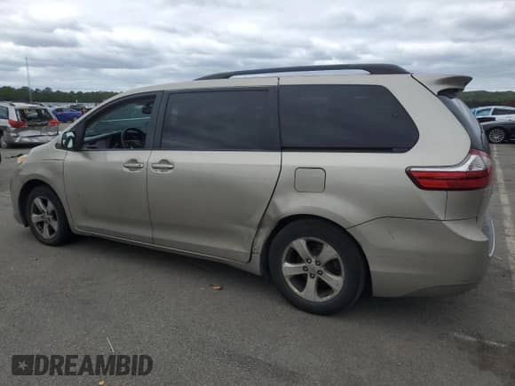 2015 Toyota Sienna LE AAS with VIN 5TDKK3DC6FS641006, listed as a Copart auction lot 69465255 with 200,844 mi miles and Clean title. Bid and sale history available at DreamBid. Image 2.