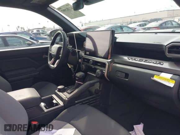 2024 Toyota Tacoma SR5 with VIN 3TMLB5JN1RM043397, listed as a IAAI auction lot 42181997 with 9,254 mi miles and . Bid and sale history available at DreamBid. Image 5.