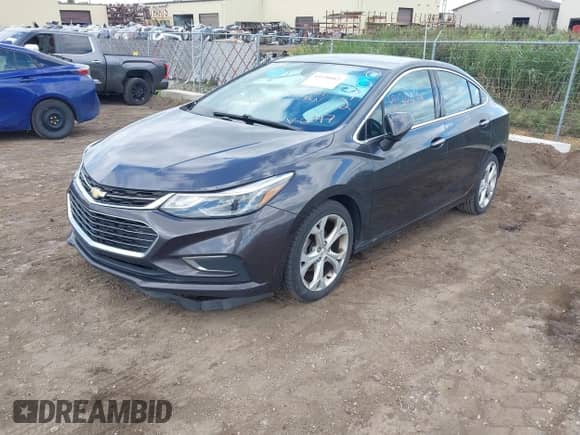2016 Chevrolet Cruze Premier with VIN 1G1BG5SM5G7326047, listed as a IAAI auction lot 43120042 with 93,404 mi miles and . Bid and sale history available at DreamBid. Image 2.