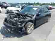 2014 Honda Accord Touring with VIN 1HGCR3F97EA026155, listed as a IAAI auction lot 42912921 with 200,256 mi miles and . Bid and sale history available at DreamBid. Image 2.