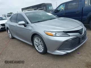 2020 Toyota Camry Hybrid XLE with VIN 4T1F31AK0LU528282, listed as a IAAI auction lot 42381278 with 91,478 mi miles and . Bid and sale history available at DreamBid. Image 1.
