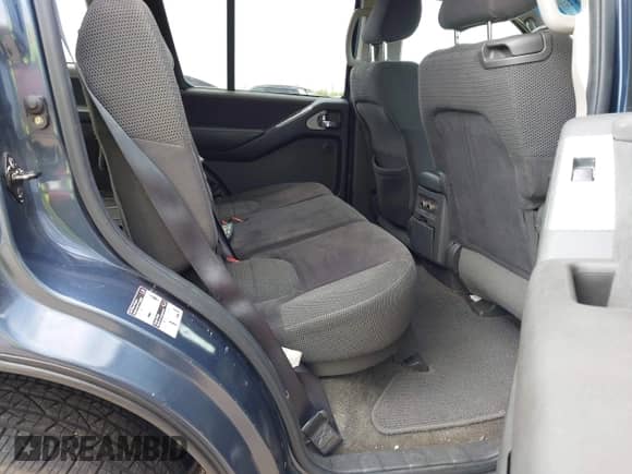 2005 Nissan Pathfinder SE with VIN 5N1AR18W95C718169, listed as a IAAI auction lot 42146371 with 128,812 mi miles and . Bid and sale history available at DreamBid. Image 8.