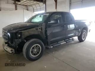 2012 Toyota Tundra z VIN 5TFUW5F11CX256513, wystawiony jako Copart lot #84803865 z przebiegiem 255 916 mil mil oraz Szkoda całkowita • Salvage title. Historia ofert i sprzedaży dostępna na DreamBid. Obrazek 1.