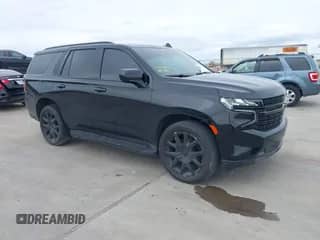 2023 Chevrolet Tahoe RST with VIN 1GNSCRKDXPR282973, listed as a IAAI auction lot 39018448 with 33,385 mi miles and . Bid and sale history available at DreamBid. Image 1.