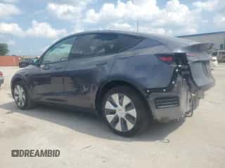 2023 Tesla Model Y with VIN 7SAYGDED6PF960648, listed as a Copart auction lot 67447254 with 18,536 mi miles and Salvage title. Bid and sale history available at DreamBid. Image 2.